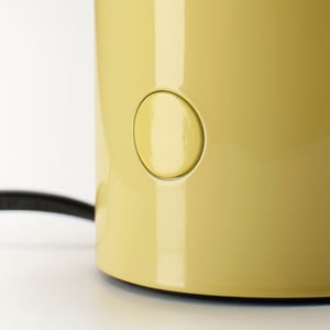 A dimmable/yellow SPETSBOJ table lamp