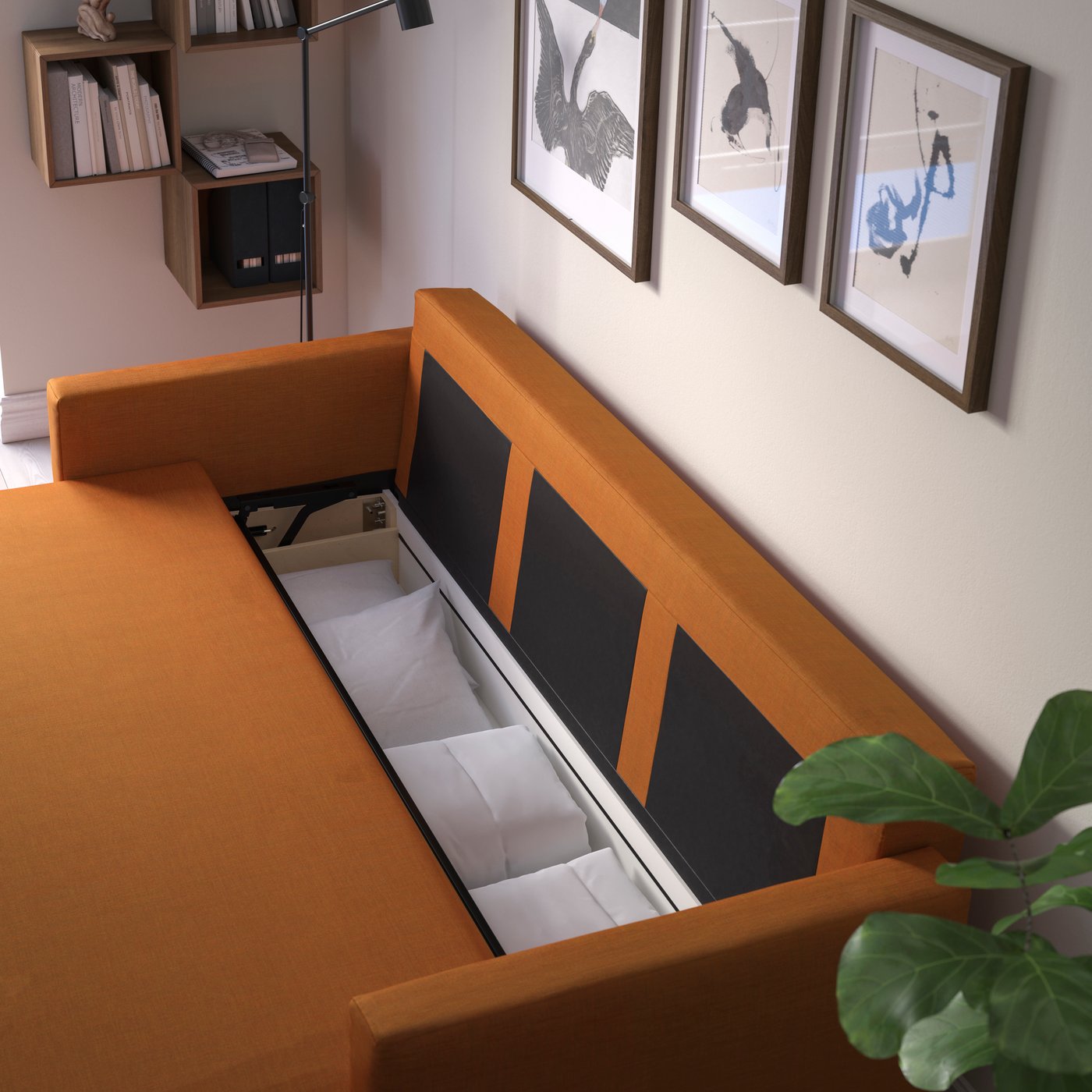 A Faringe brown-orange FRIHETEN 3-seat sofa-bed in the living room
