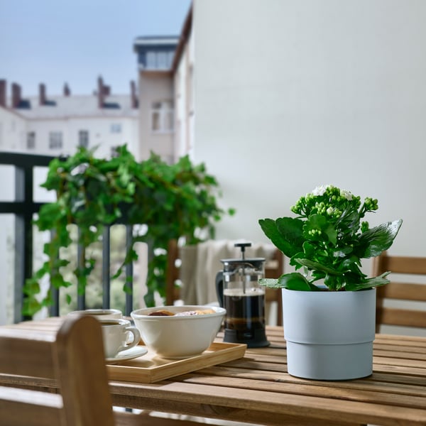 An in/outdoor pale blue NYPON plant pot