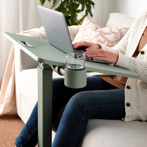 A green MITTZON laptop table with castors