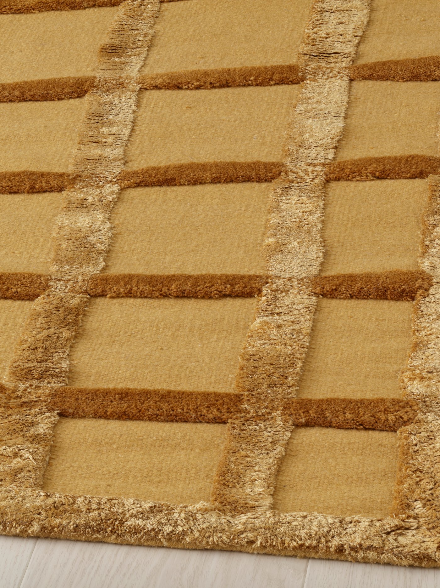 An yellow/handmade SKUGGSVINGEL rug, flatwoven