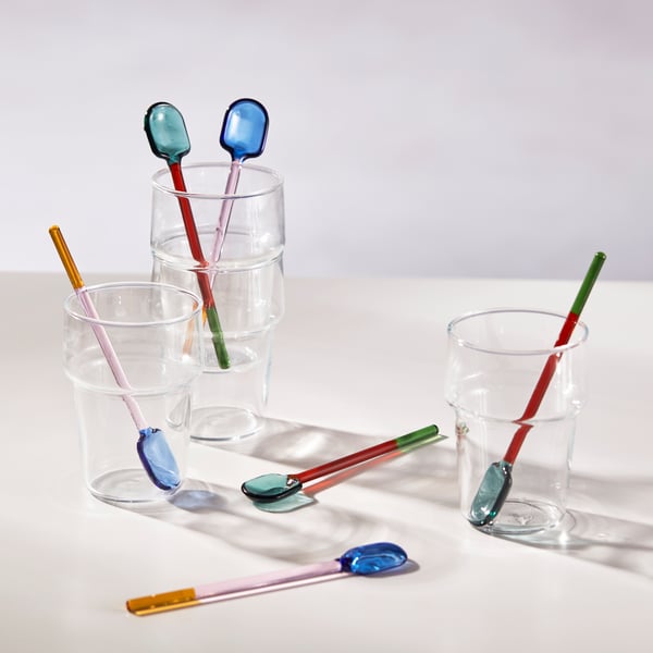 A glass/multicolour FENGÖMMARE spoon