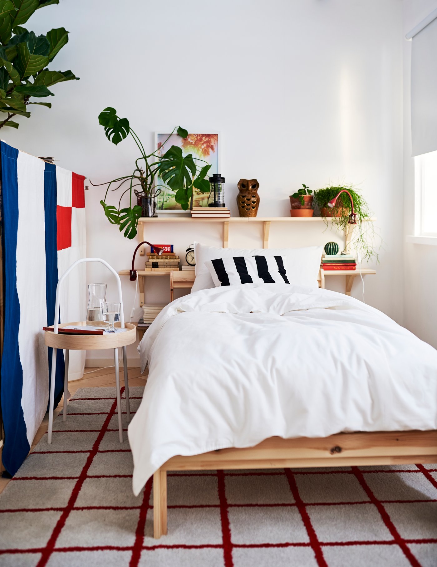 An outdoor/terracotta INGEFÄRA plant pot with saucer in the bedroom