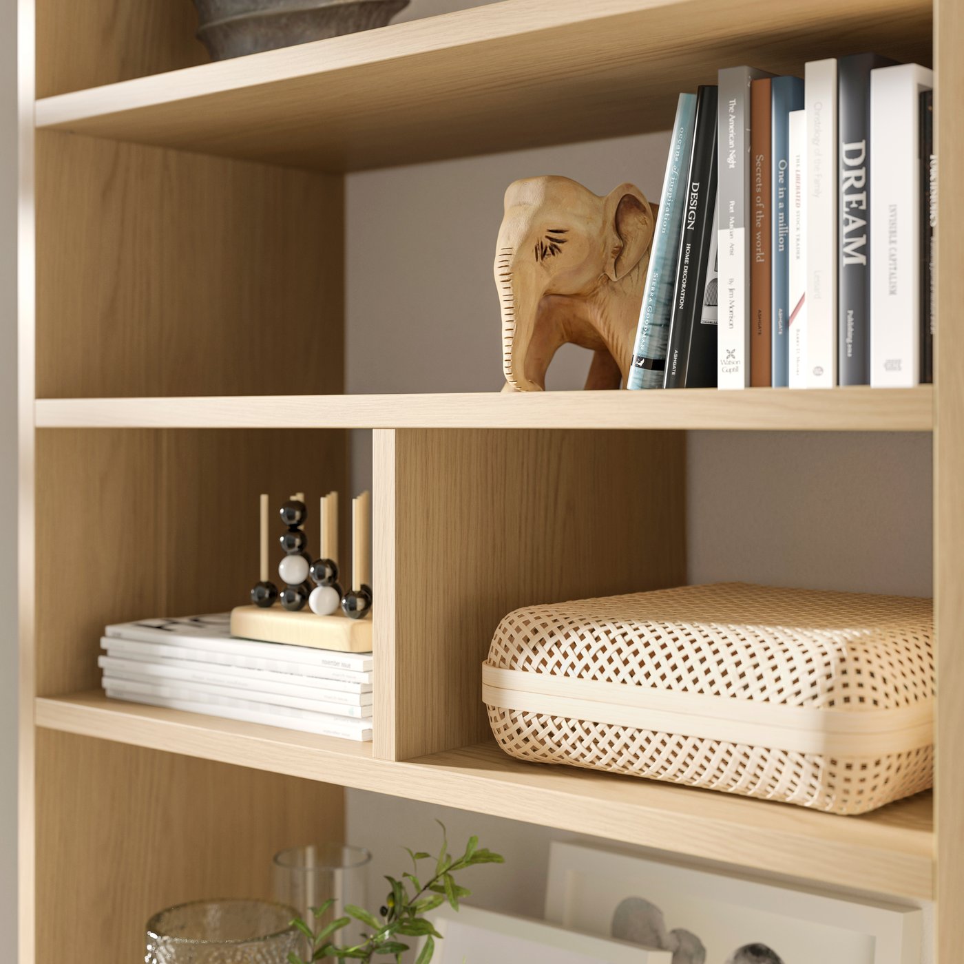 An oak effect LÅDMAKARE insert with compartments in the living room
