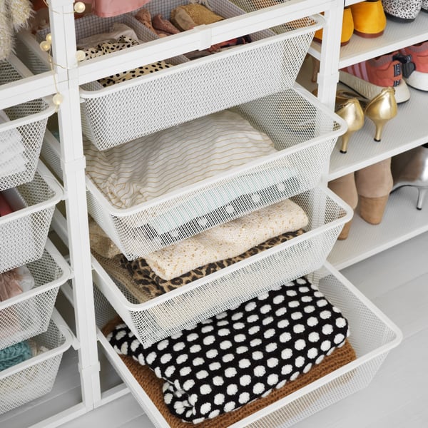 A white JONAXEL storage combination