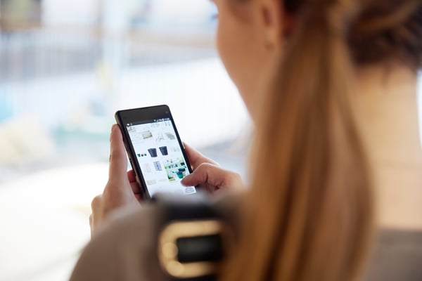 woman looking at phone