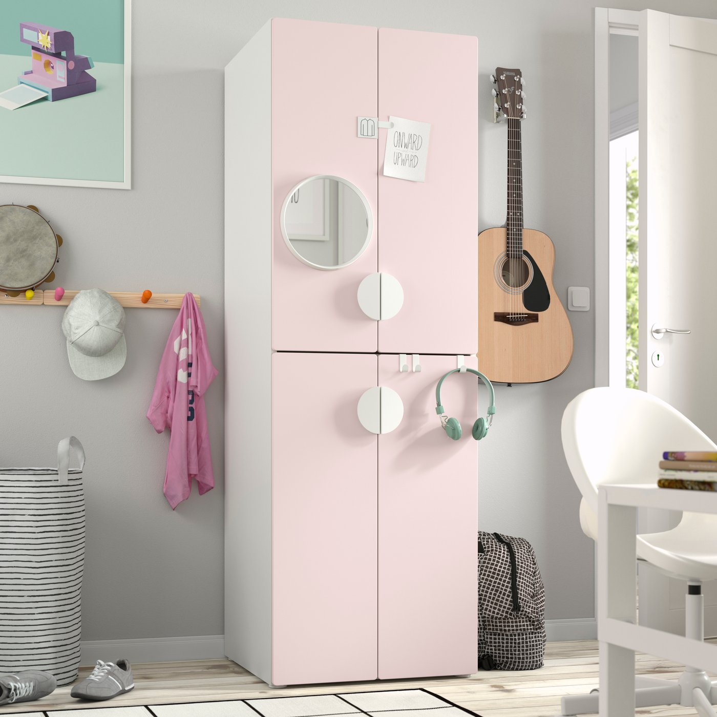A white pale pink/with 2 clothes rails PLATSA wardrobe in the childrens room