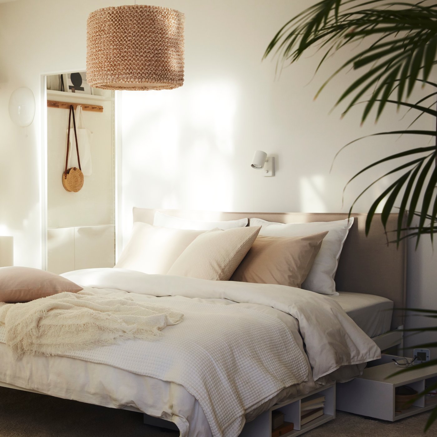 A white/Vissle beige KLEPPSTAD bed frame in the bedroom