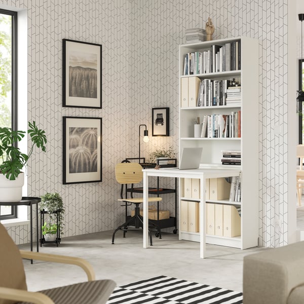 A white BILLY Bookcase with desk