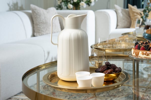 A gold effect/glass TORSJÖ coffee table