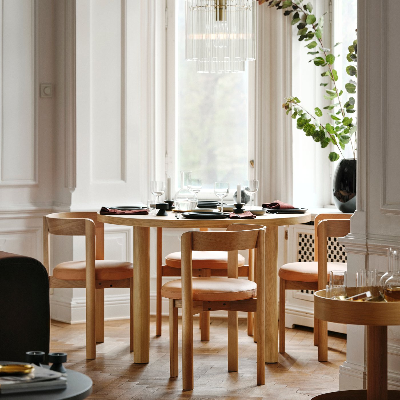 An oak/leather STOCKHOLM 2025 chair in the dining room