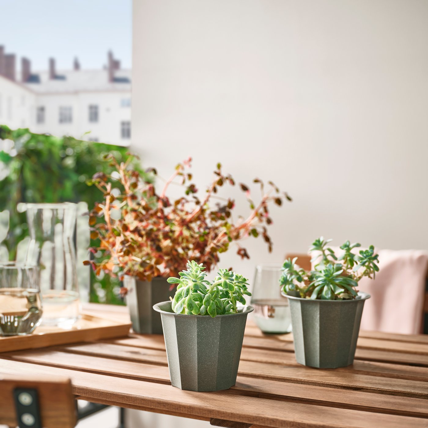 A light brown stained NÄMMARÖ table, outdoor