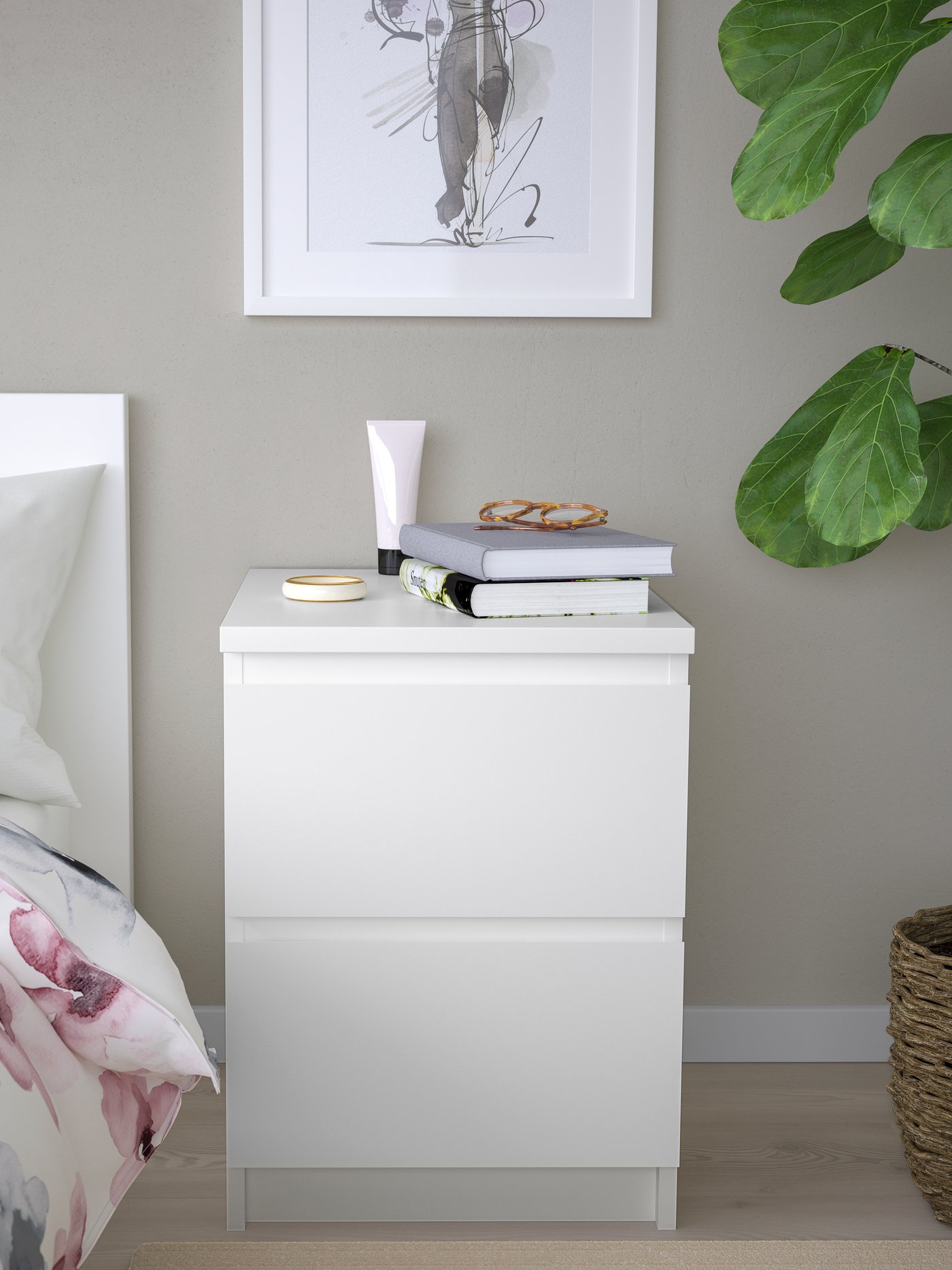 A white MALM chest of 2 drawers