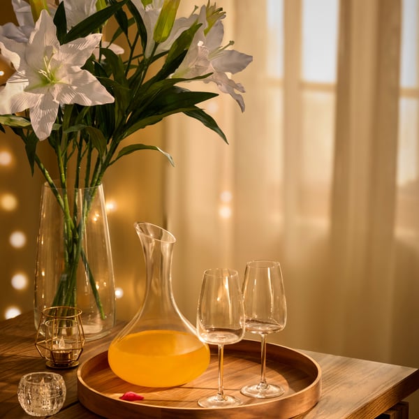 A clear glass STORSINT carafe
