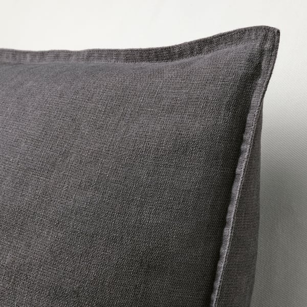 A dark grey DYTÅG cushion cover