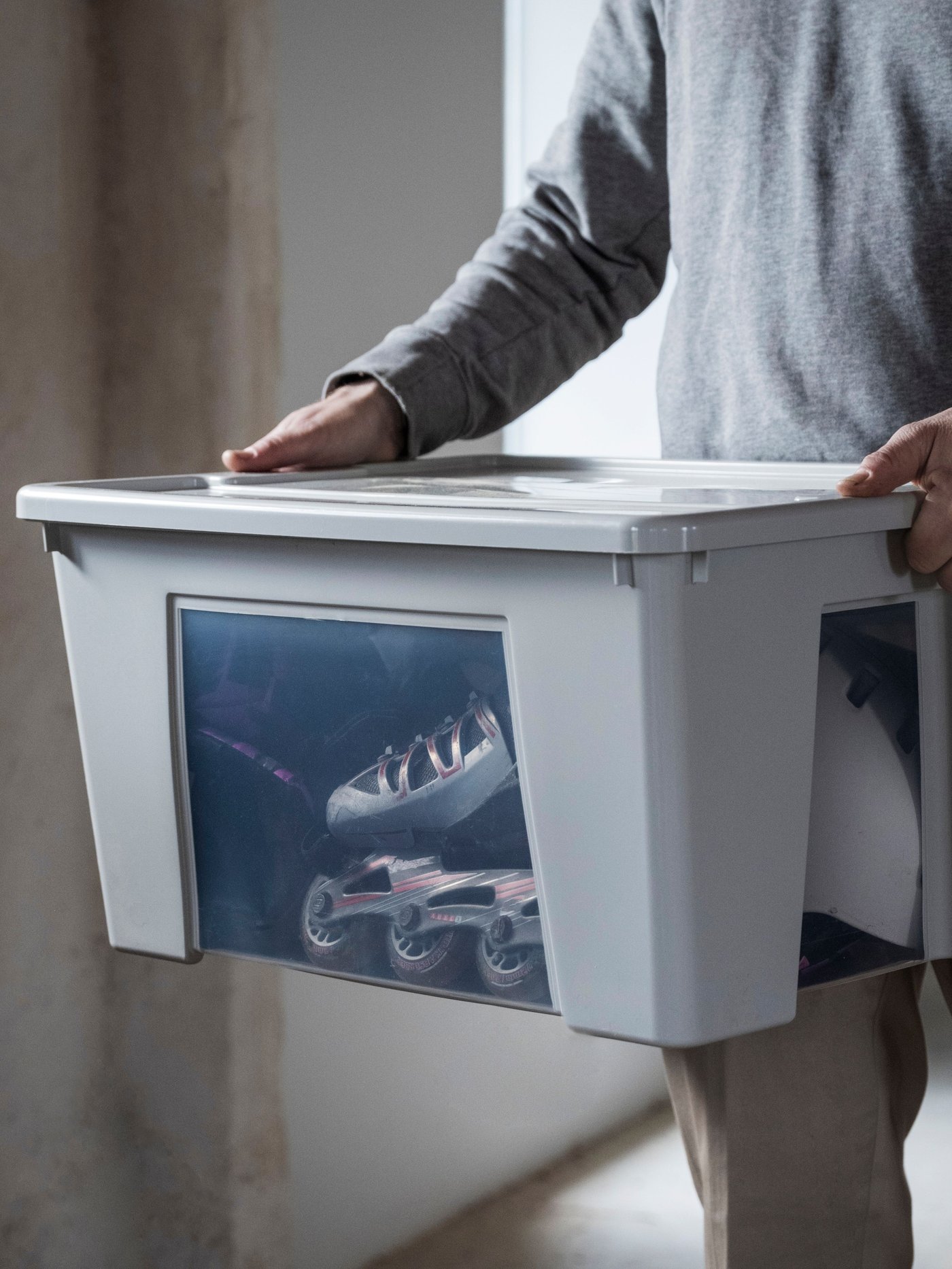 A transparent/light grey SAMLA box