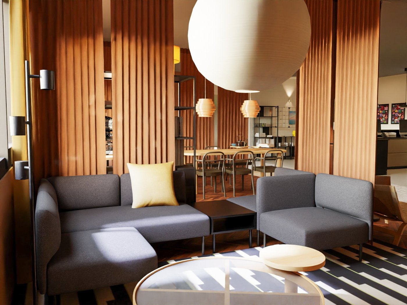 Teil einer Hotellobby. Im Vordergrund eine Sitzgruppe mit Ablage, im Hintergrund ein länglicherTisch mit sechs Stühlen.