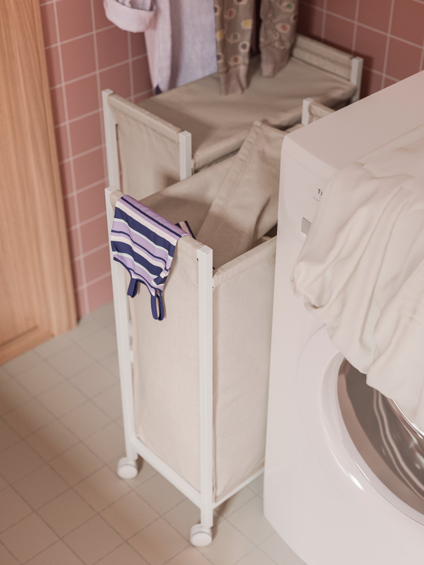 An IKEA 500 UDDARP tumble dryer in the bathroom