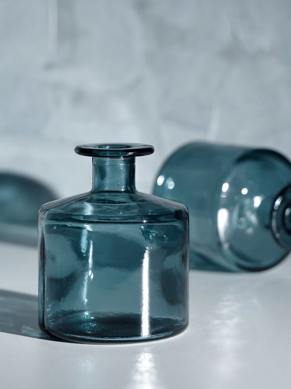 A blue MYRMOSAIK vase.