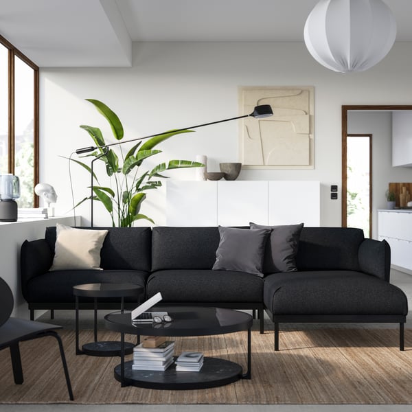 A Gunnared black/grey ÄPPLARYD 3-seat sofa with chaise longue.