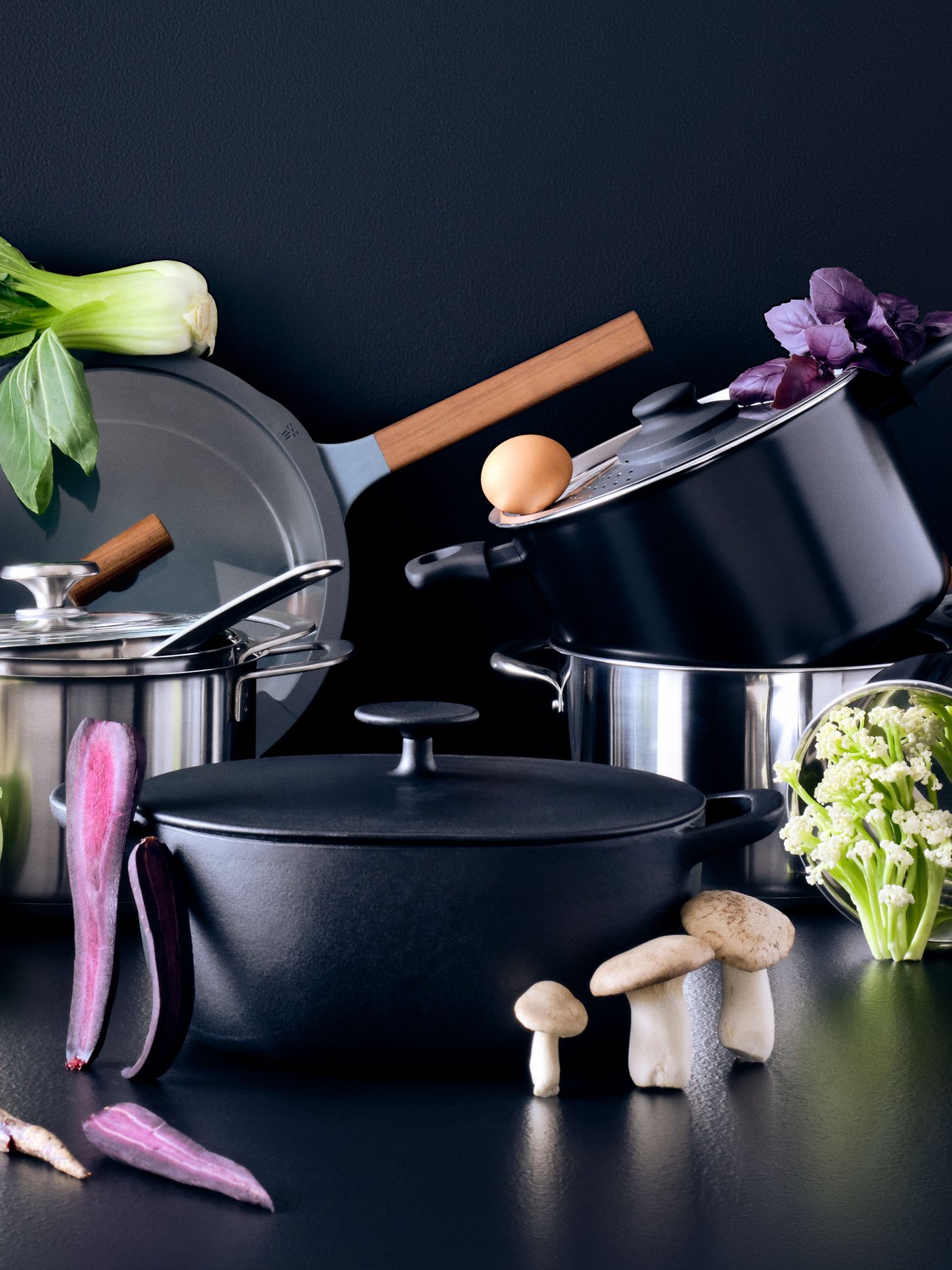 KLIPPFISK pot with lid and KLIPPFISK sauté pan with lid, VARDAGEN casserole with lid and IKEA365+ pot with lid on a surface.