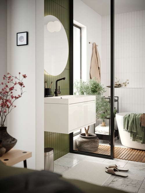 Bathroom corner featuring an ÄNGSJÖN wash stand with drawer, wash basin and tap supporting a GANSJÖN 3 piece bathroom set.