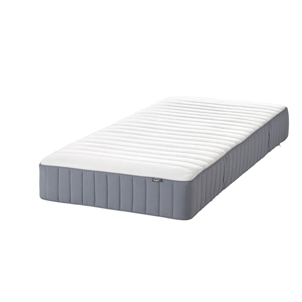 A firm/light blue VALEVÅG pocket sprung mattress in the NA