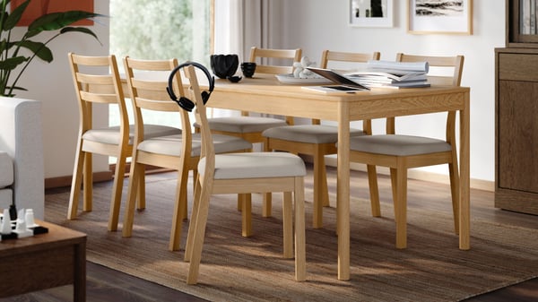 An oak veneer TONSTAD table in the dining room