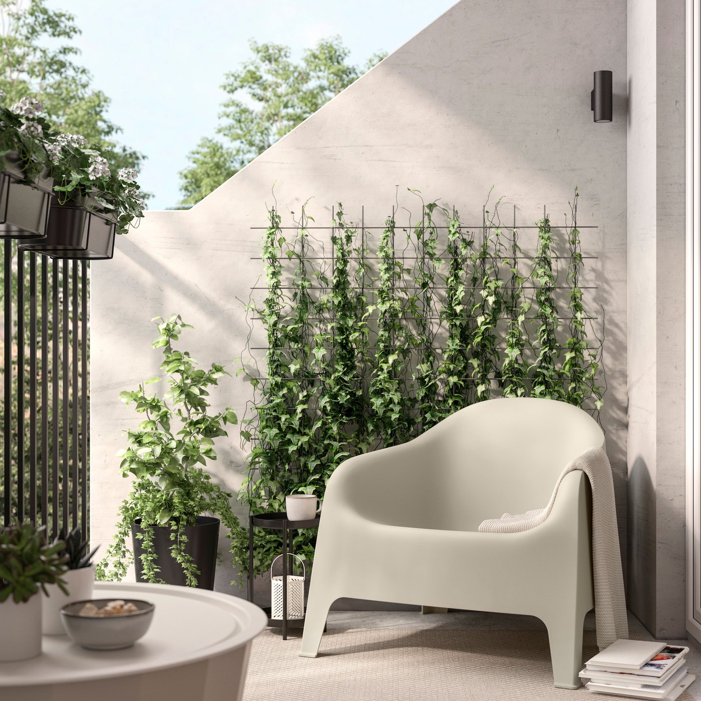 A beige SKARPÖ armchair, outdoor outside