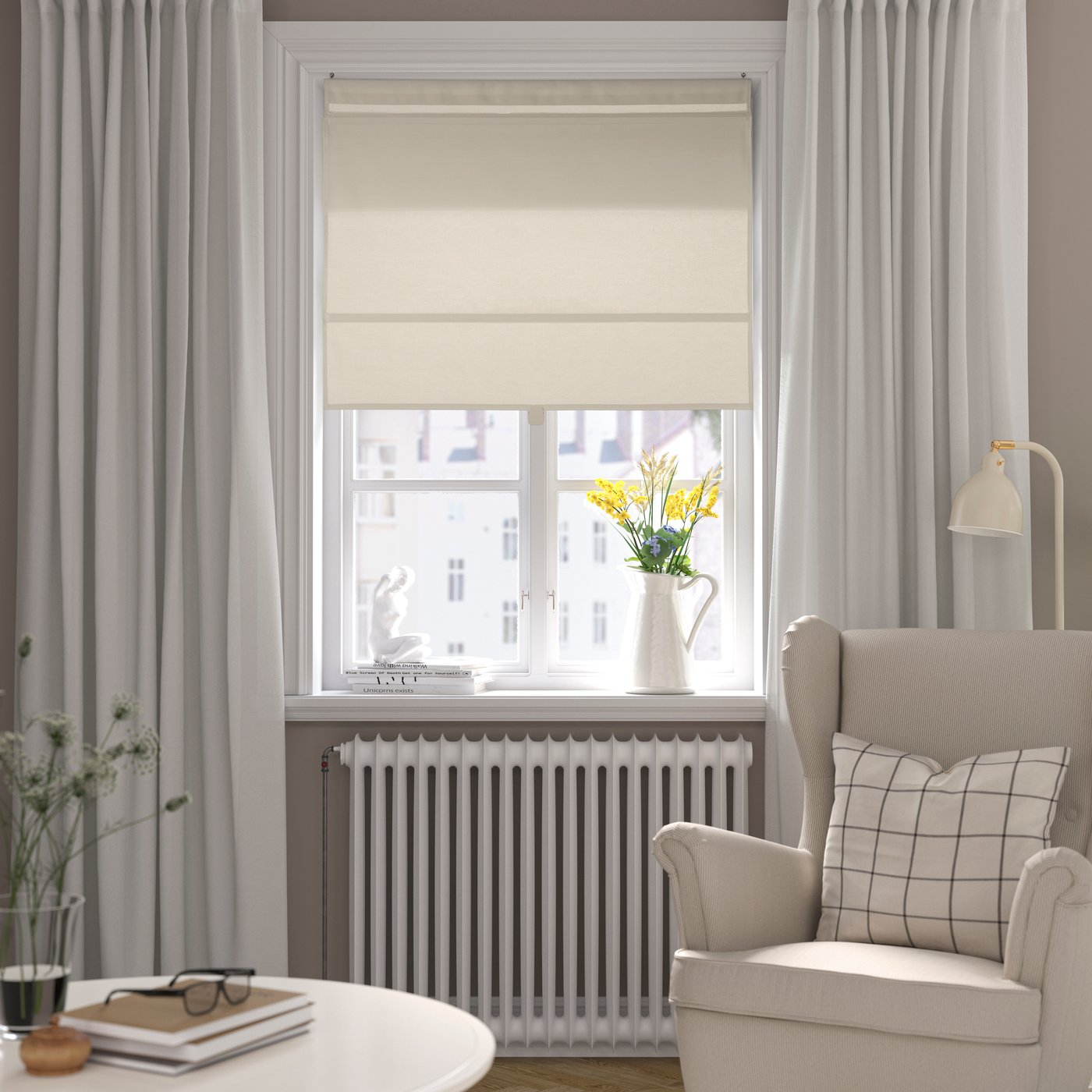 A beige RINGBLOMMA Roman blind