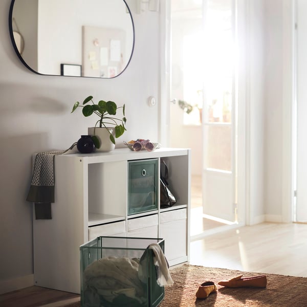 A white KALLAX shelving unit