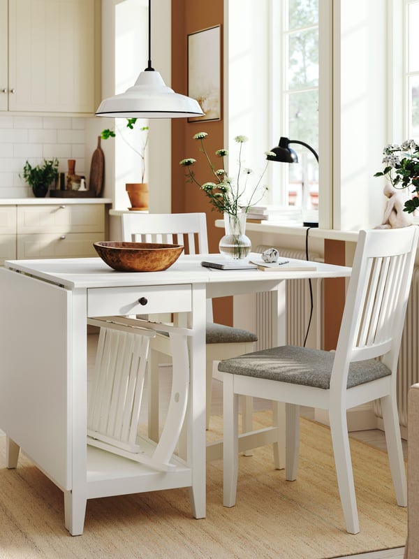 A white NÄSINGE gateleg table with storage