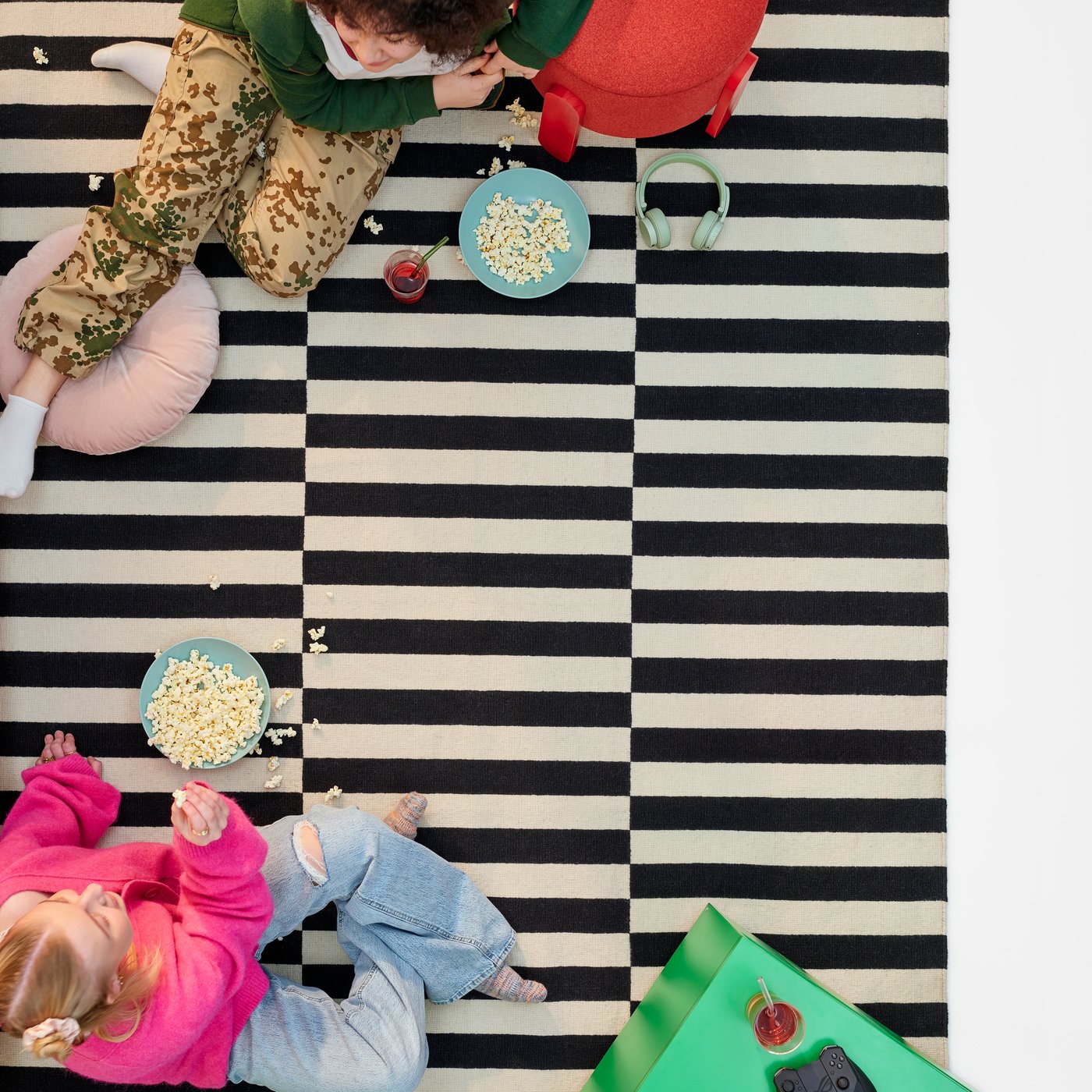 A handmade/striped black/off-white STOCKHOLM rug, flatwoven