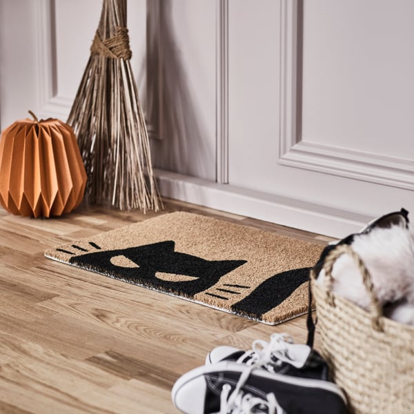 A cat pattern black/natural KUSTFYR door mat