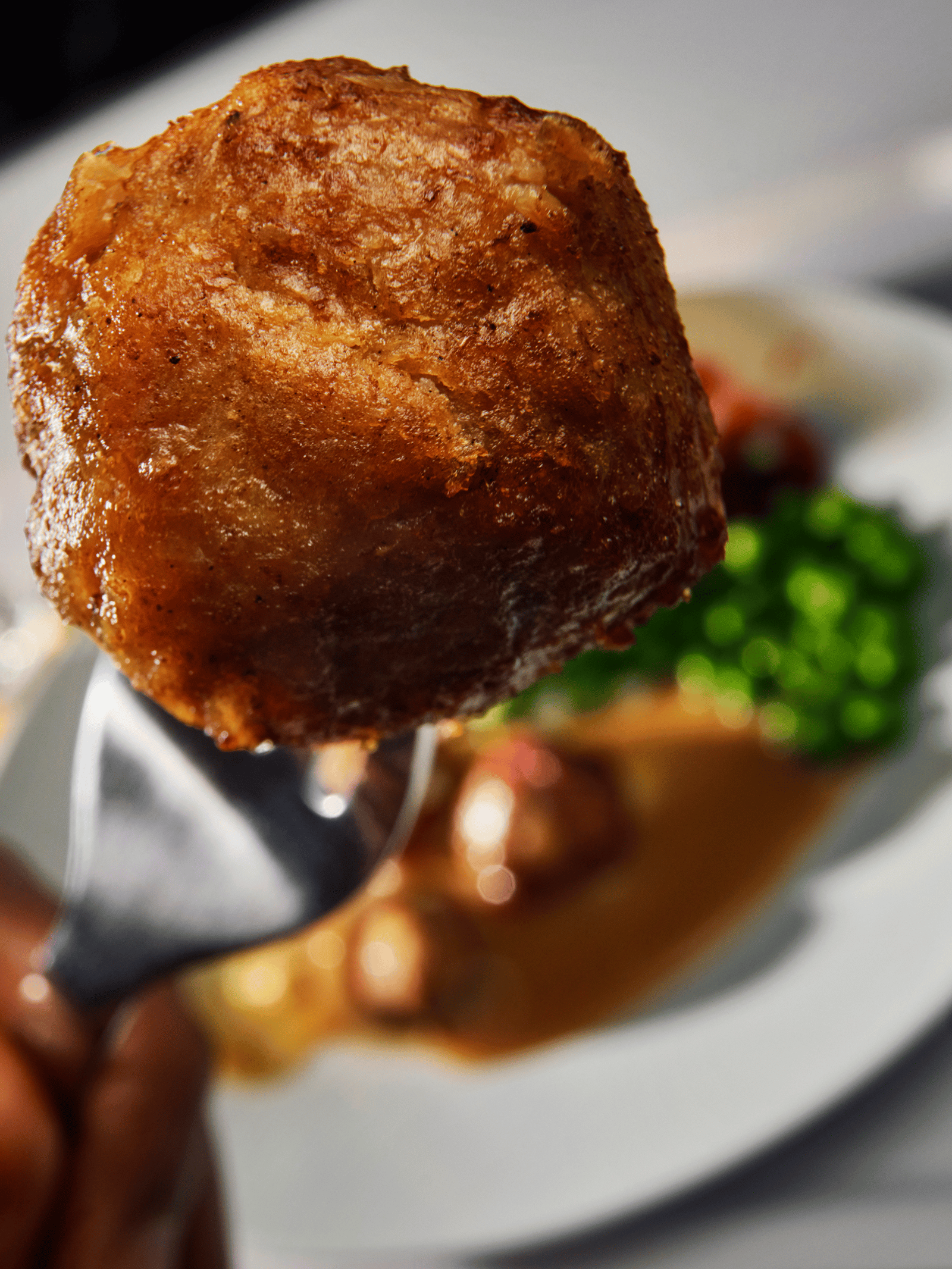 En HUVUDROLL plantebollde på en gaffel.