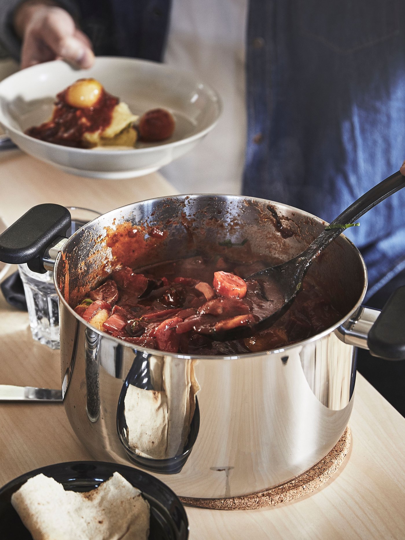 A white GODMIDDAG deep plate