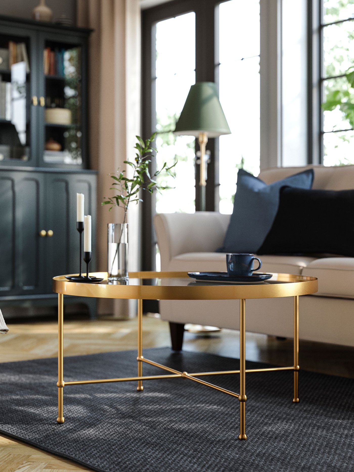 A gold effect/glass TORSJÖ coffee table