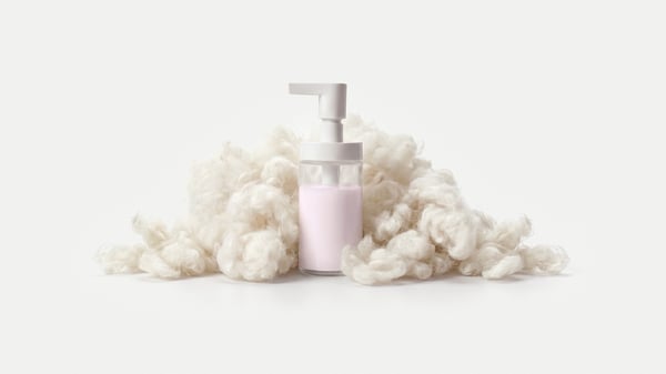 a TACKAN soap dispenser surrounded by wool