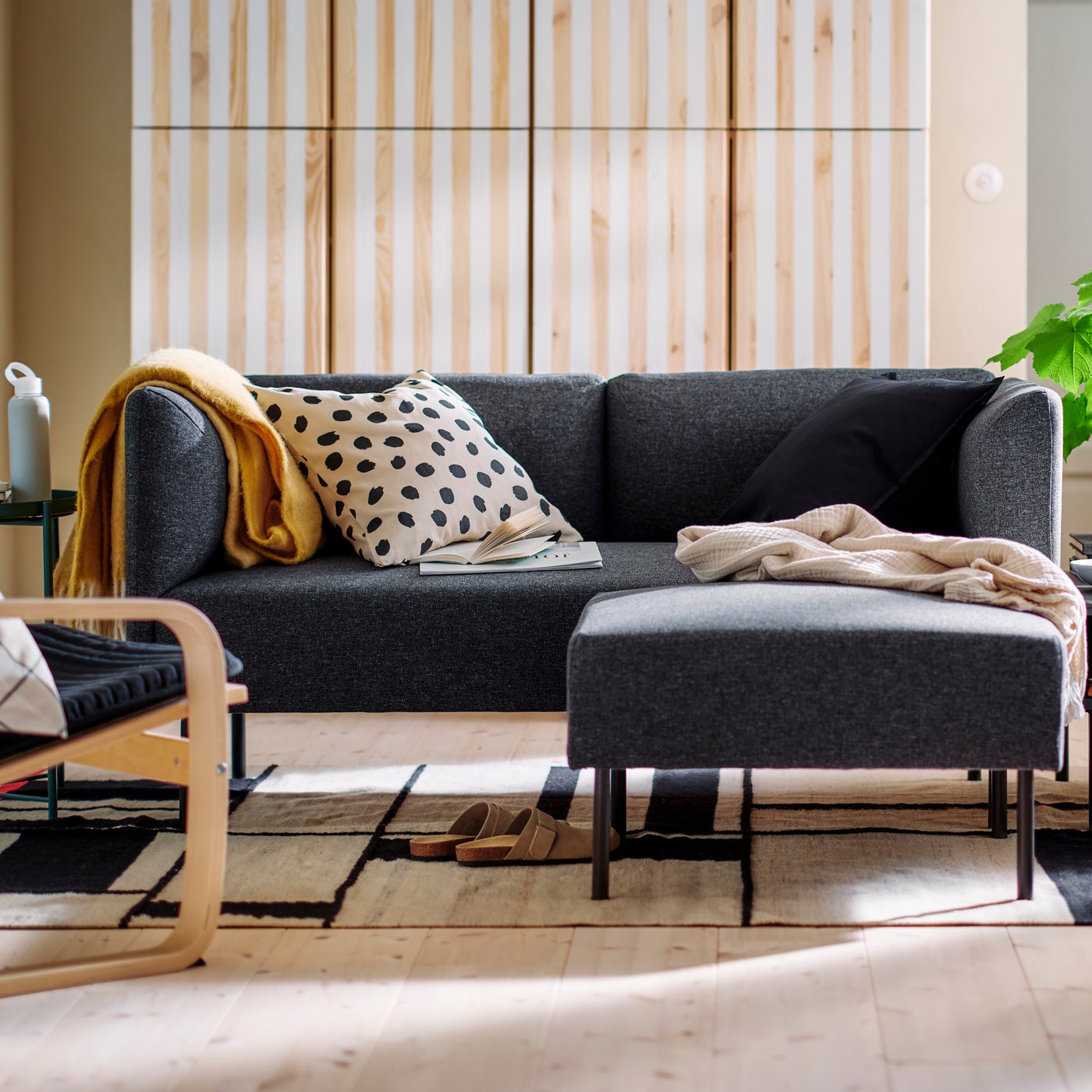Modular LILLEHEM seating stands in a modern Scandi living room on a RASTPLATS rug in front of some IVAR storage.