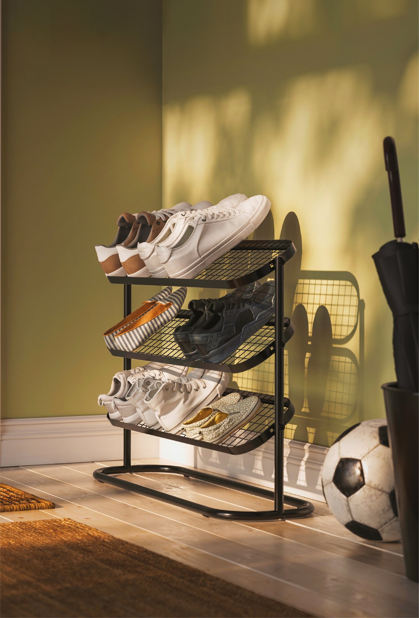 Shoes on a ÄLGANÄS shoe rack