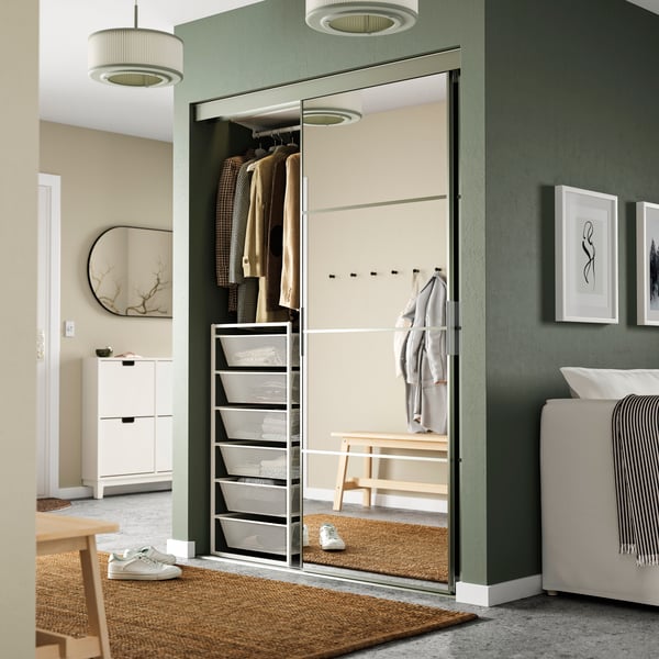 A white JONAXEL storage combination