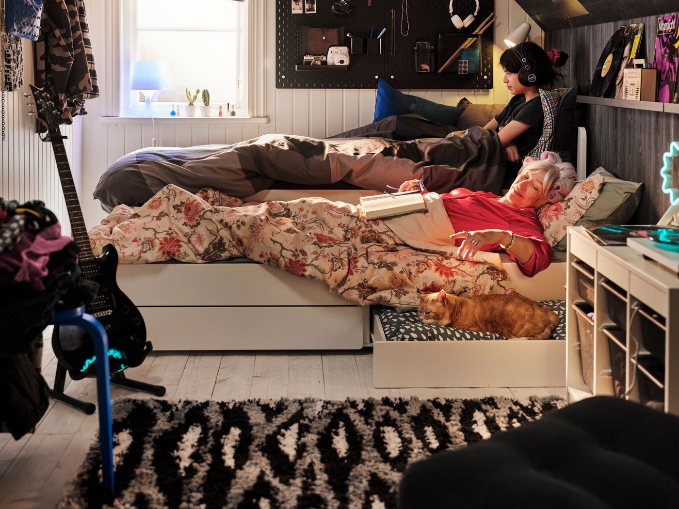 A white LAMPAN table lamp in the bedroom