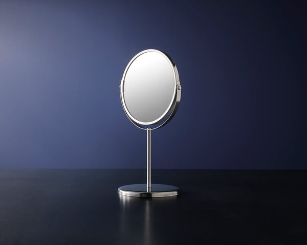 A stainless steel TRENSUM mirror