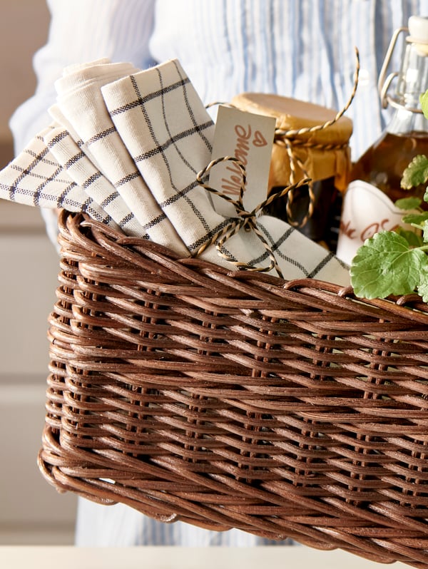 A white/dark grey/patterned RINNIG tea towel in the kitchen