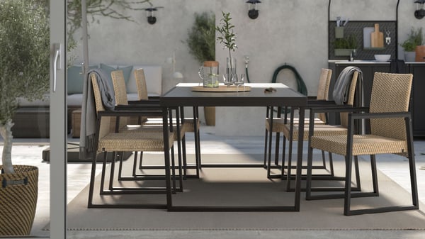 A dark grey VÄRMANSÖ table, outdoor