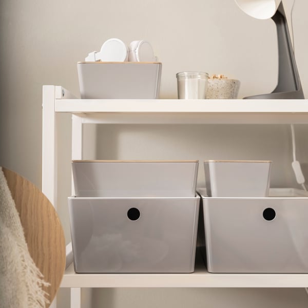 A light grey/bamboo KUGGIS box with lid