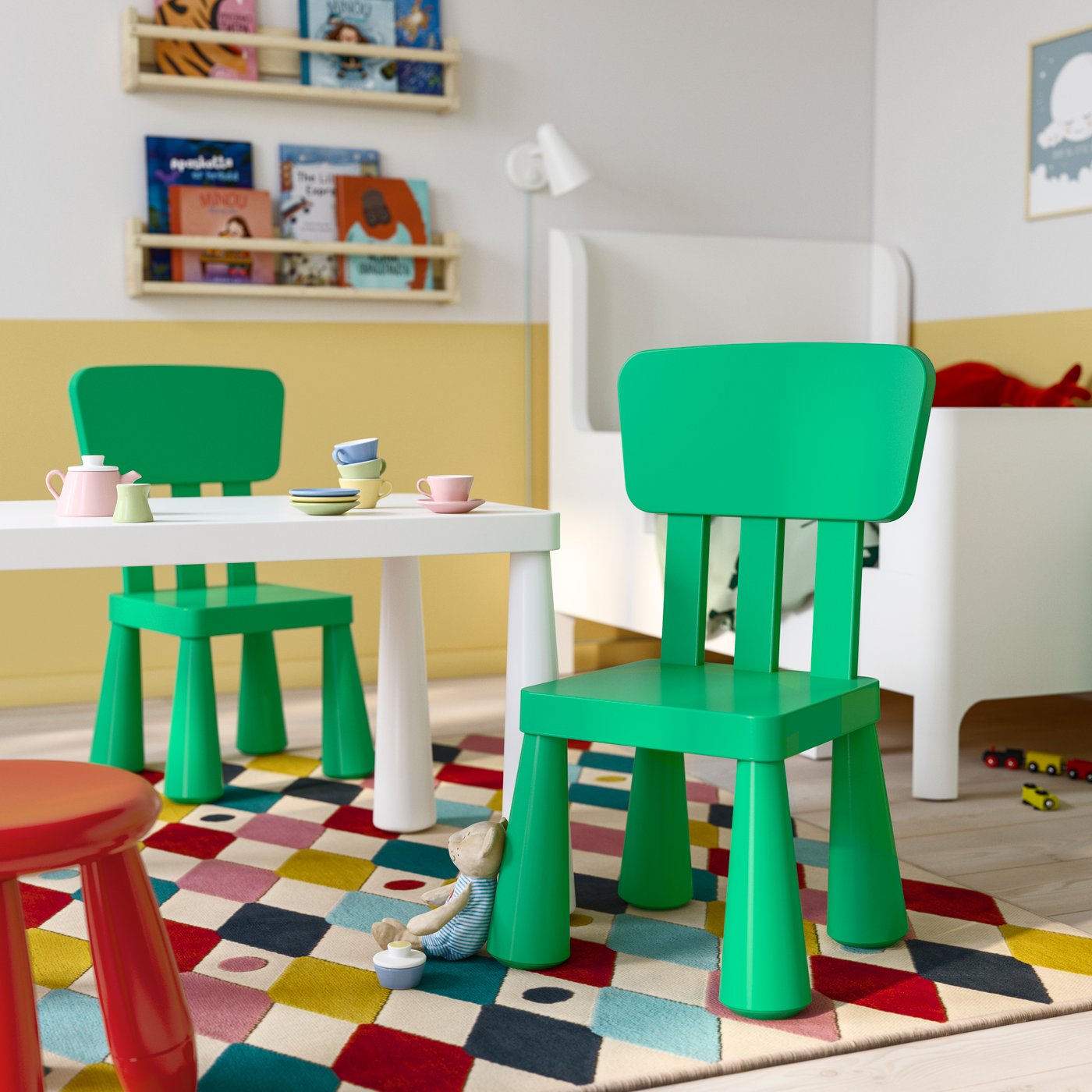 An in/outdoor/bright green MAMMUT children's chair