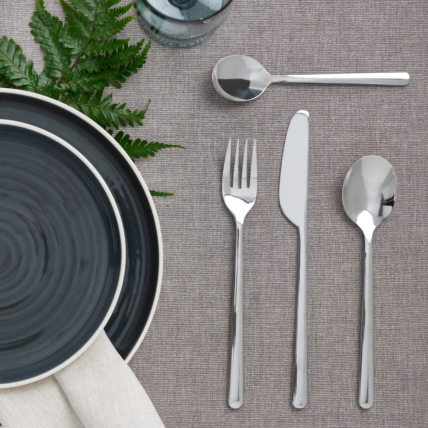 A stainless steel LÖFTESRIK 24-piece cutlery set