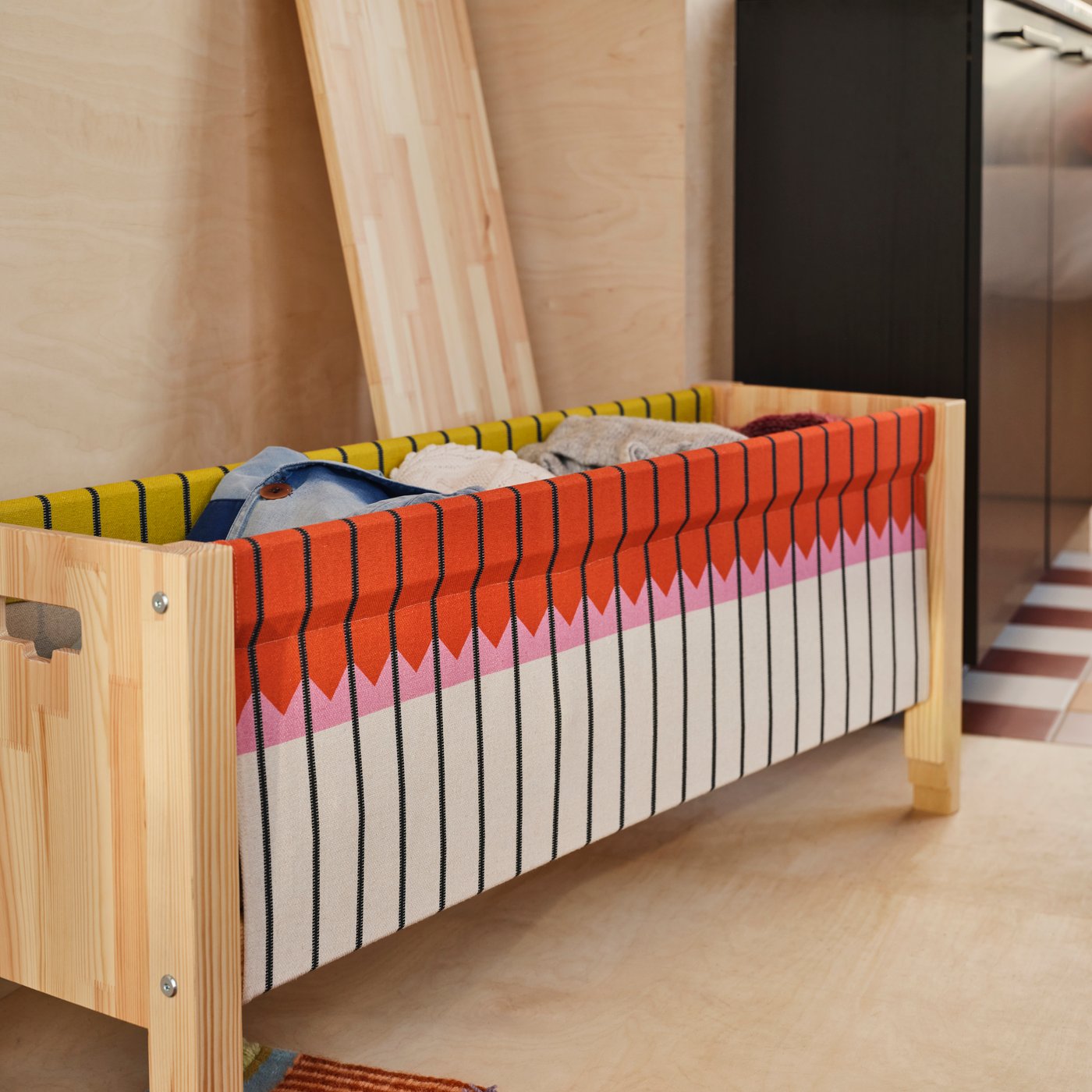 An OMMJÄNGE bench with storage