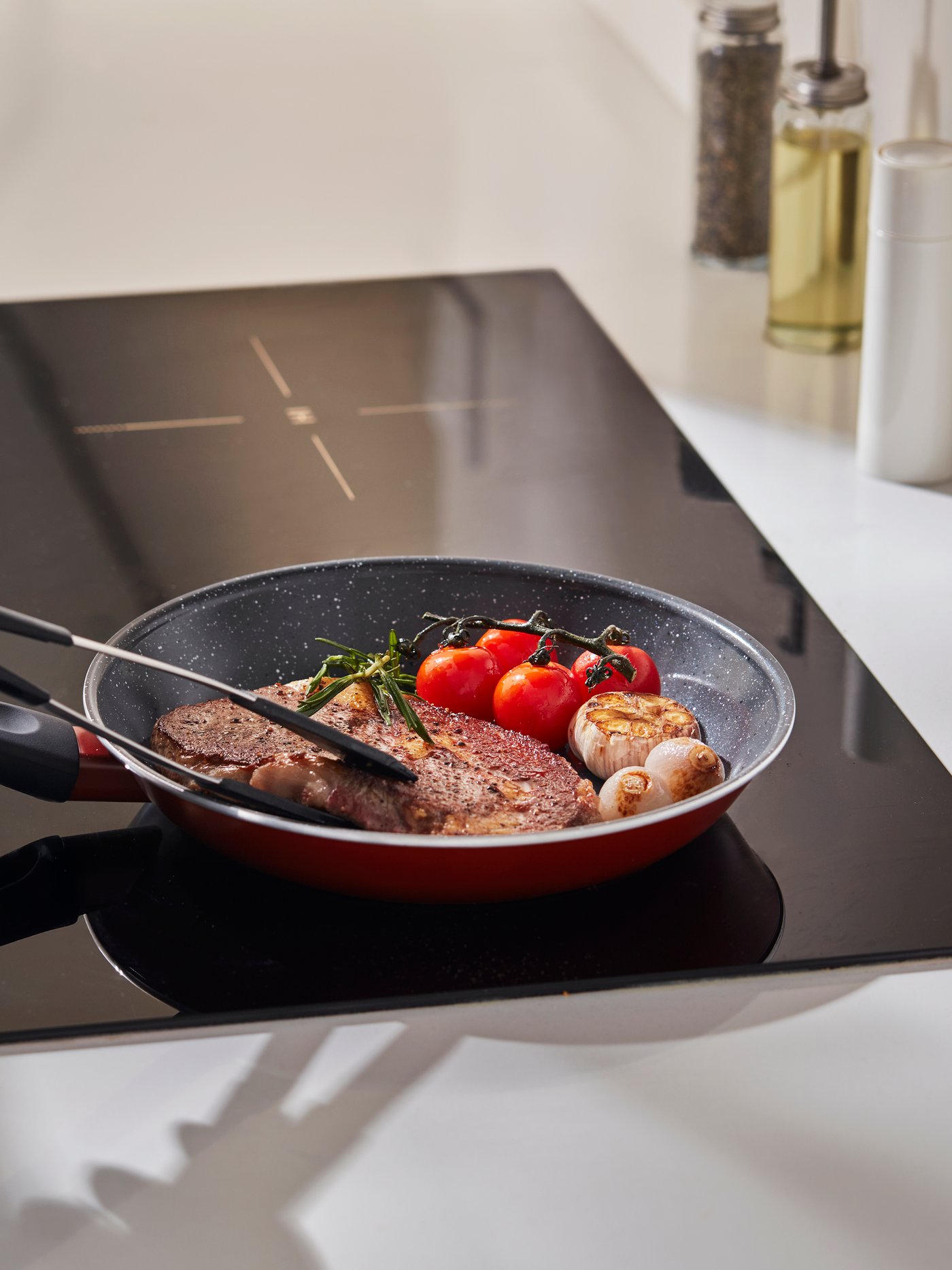 A non-stick coating red HEMLAGAD frying pan in the kitchen